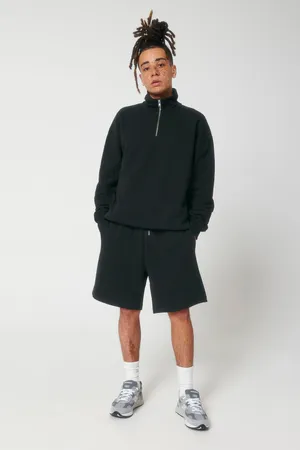 Das Boxy Unisex-Sweatshirt mit kurzem Reißverschluss und trockenem Griff
