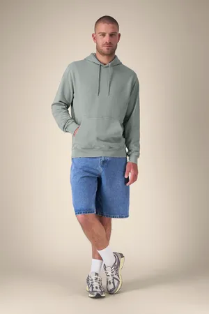 Der Garment-Dyed Unisex-Hoodie aus French Terry