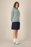 Der Garment-Dyed Unisex-Hoodie aus French Terry