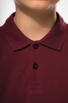 Polohemd mit langen Ärmeln für Kinder.