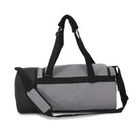 Tubular sports bag with separate shoe compartment