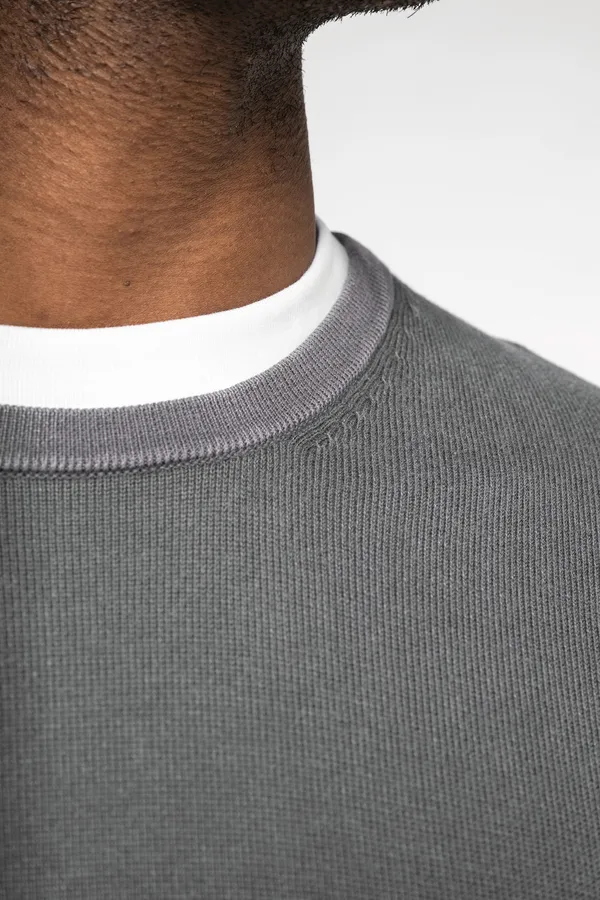 Eco-friendly men’s washed effect crew neck jumper