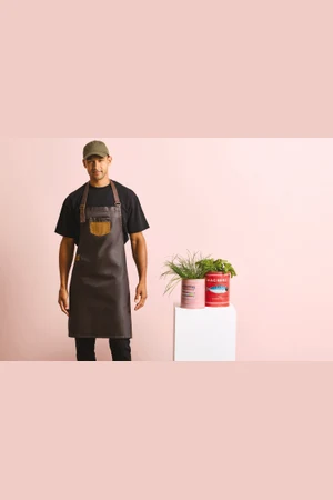 Division - Waxed look denim bib apron with faux leather