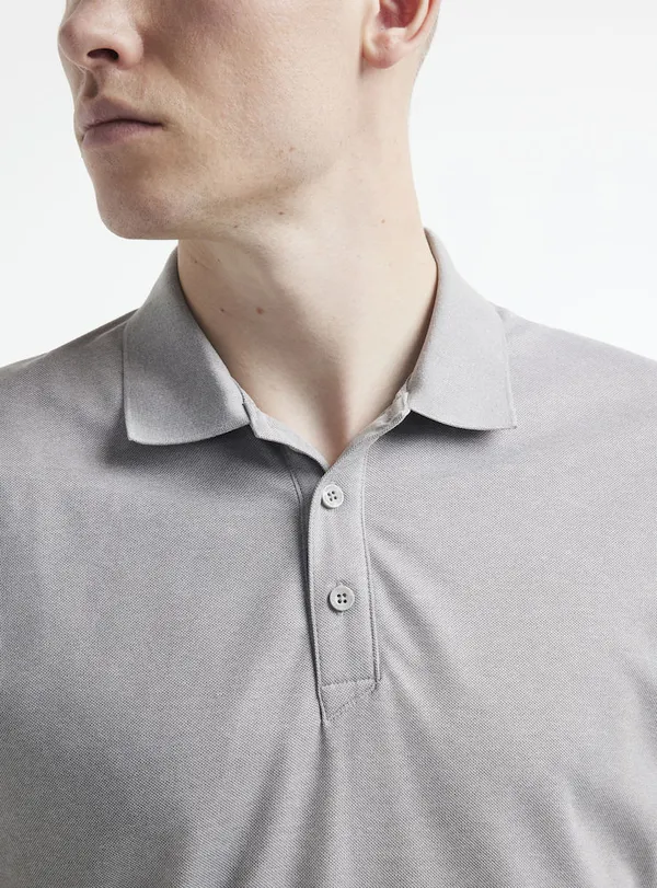 1909138-975000_CORE Unify Polo Shirt  M_Closeup3.jpg