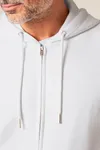 Der Unisex-Zip-Hoodie aus French Terry