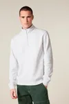 Das Unisex-Sweatshirt mit kurzem Reißverschluss