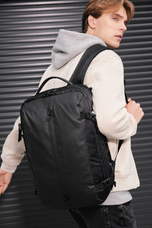 Business backpack with front soft pocket