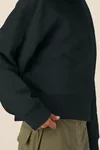 Der Boxy Unisex-Hoodie aus recycelter Baumwolle