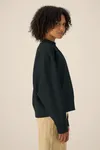 Das Boxy Rundhals-Unisex-Sweatshirt aus recycelter Baumwolle