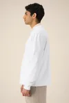 Das Rundhals-Unisex-Sweatshirt aus recycelter Baumwolle