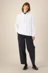 Der Unisex-Hoodie aus recycelter Baumwolle