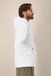 Der Unisex-Hoodie aus recycelter Baumwolle