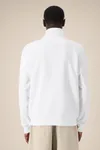 Das Unisex-Sweatshirt mit Reißverschluss und Stehkragen