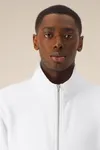 Das Unisex-Sweatshirt mit Reißverschluss und Stehkragen