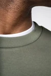 Umweltfreundliches Unisex Sweatshirt mit Rundhalsausschnitt und hängenden Schultern aus gebürstetem Molton