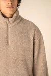 Unisex-Sweatshirt mit 1/4-Reißverschluss und überschnittenen Schultern aus Sherpa-Material